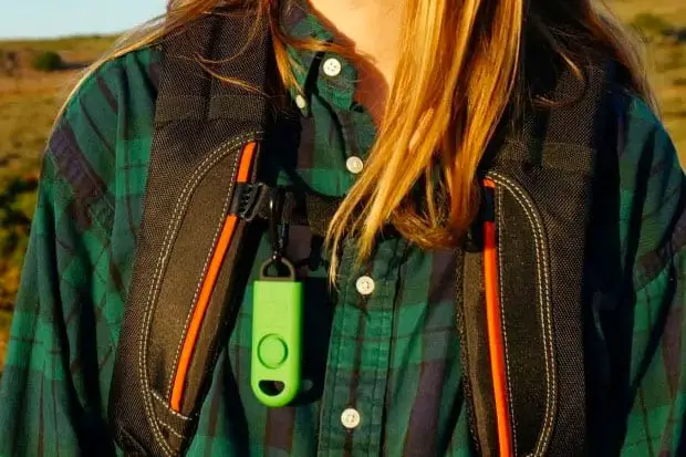 Basu personal alarm attached to a backpack